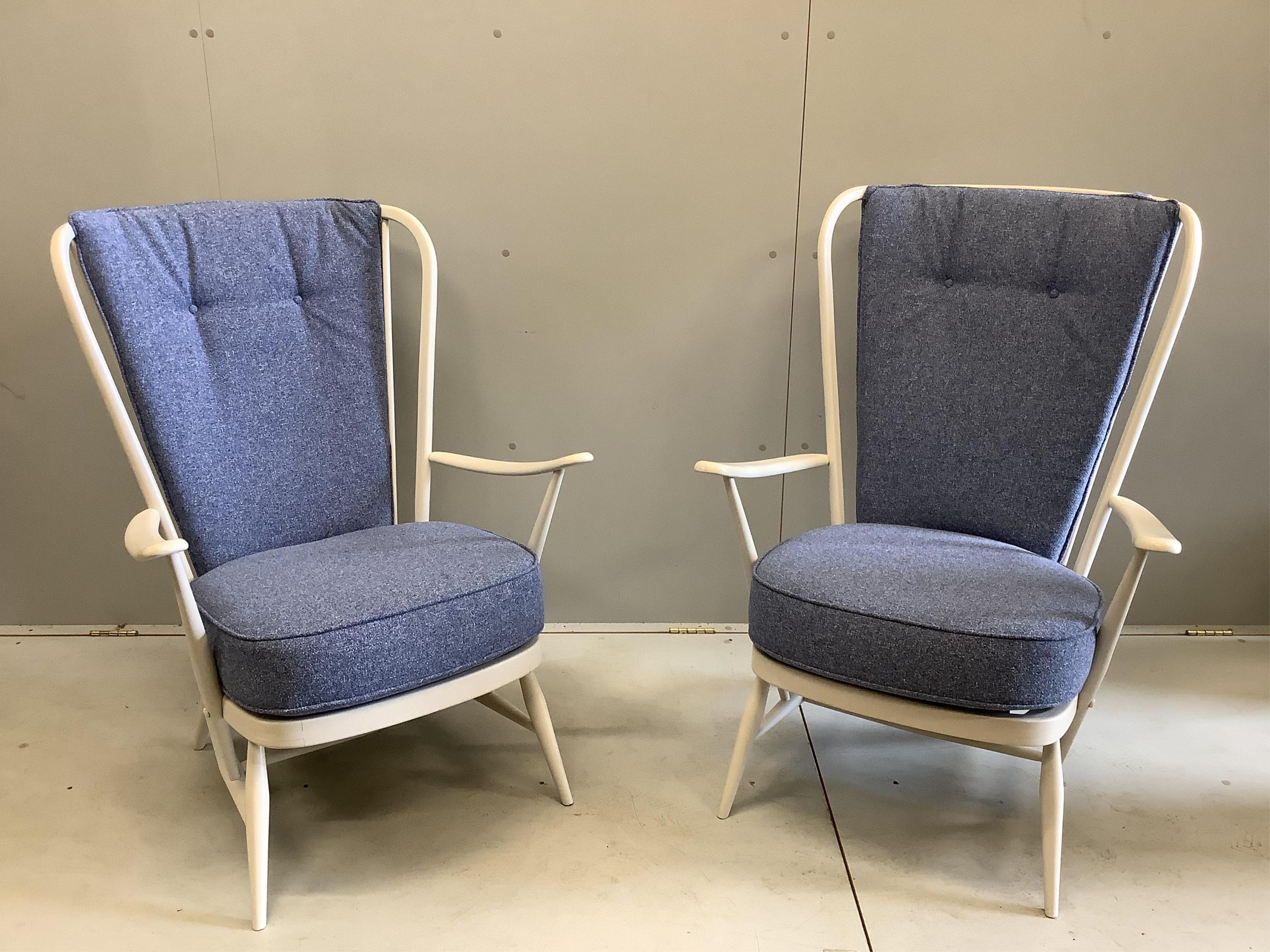 A pair of Ercol Evergreen armchairs, width 73cm, depth 60cm, height 104cm
